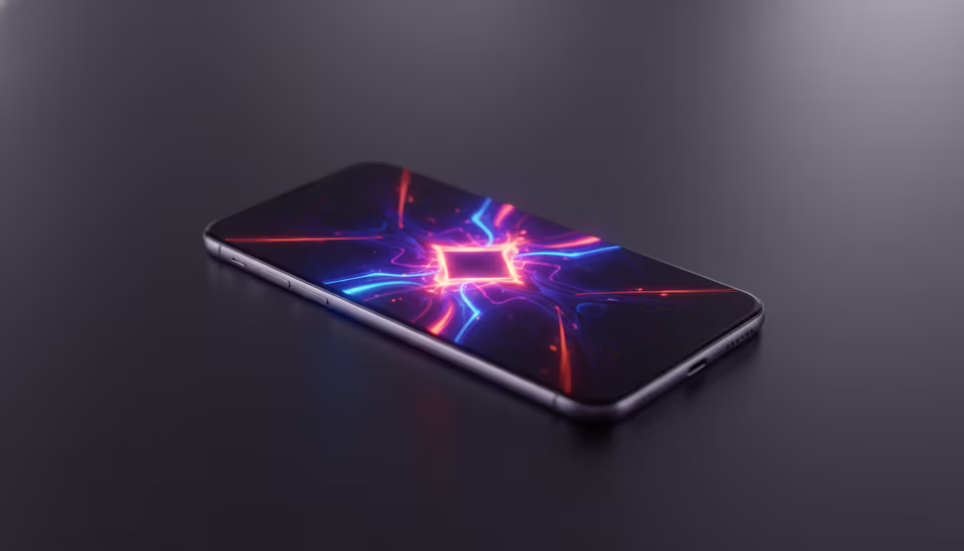 Smartphone lying on dark surface displaying colorful neon game graphics with vibrant purple blue and orange glow